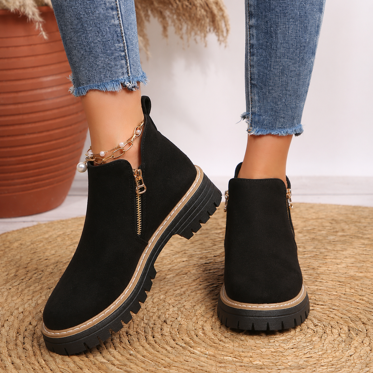 Robyn Comfort Ankle Boots in black suede with side zipper, worn on both feet - The Gold Coast Family