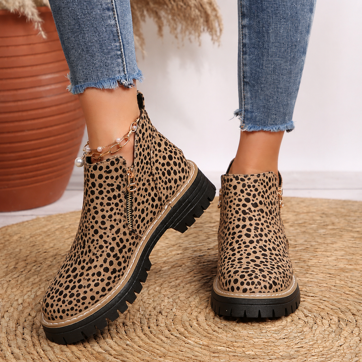 Robyn Comfort Ankle Boots in leopard print with side zipper, worn on both feet - The Gold Coast Family