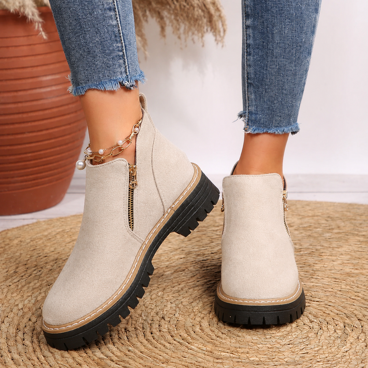 Robyn Comfort Ankle Boots in cream beige suede with side zipper, worn on both feet - The Gold Coast Family