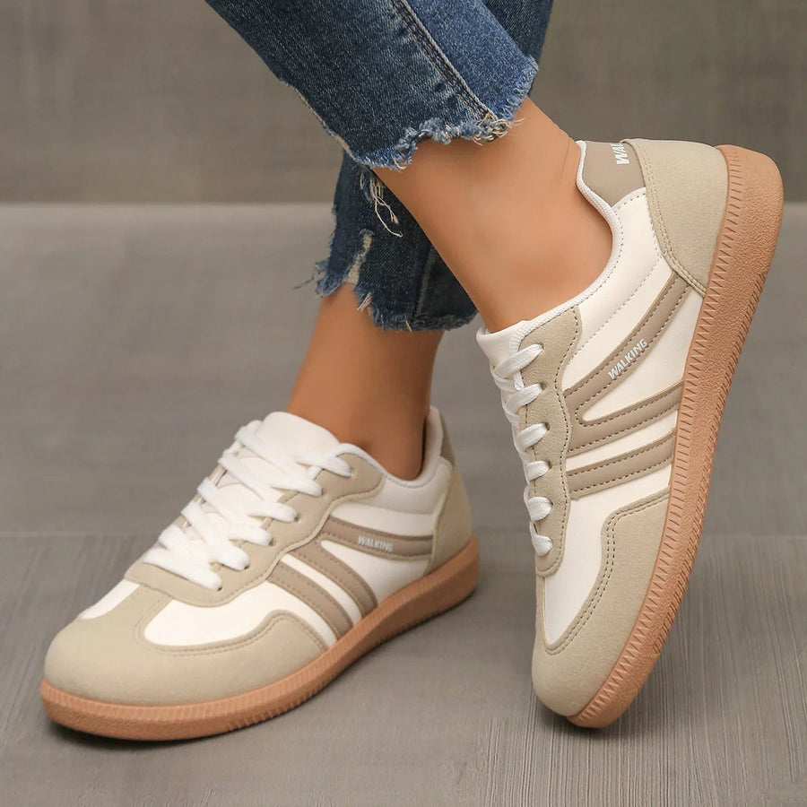 Briony Orthopaedic Cushioned Trainers in cream and tan with gum sole, worn on foot - The Gold Coast Family
