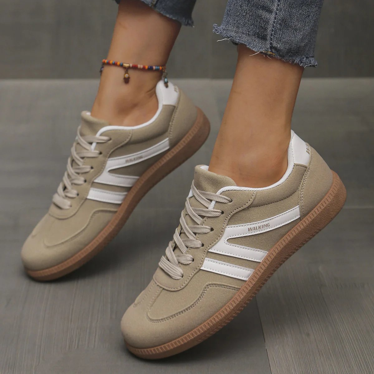 Briony Orthopaedic Cushioned Trainers in beige tan with white stripes, worn on foot - The Gold Coast Family