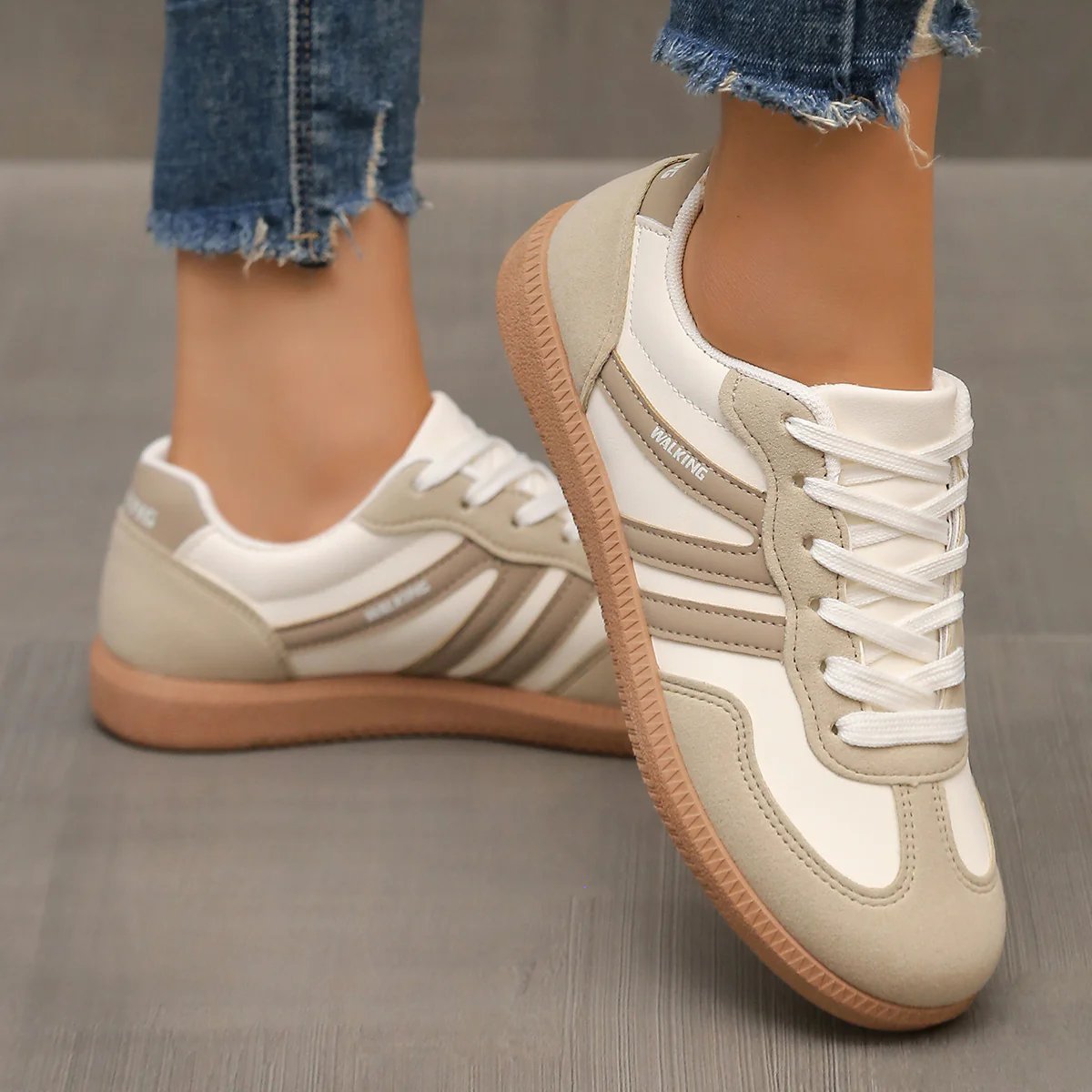 Briony Orthopaedic Cushioned Trainers in white and beige, worn on foot - The Gold Coast Family