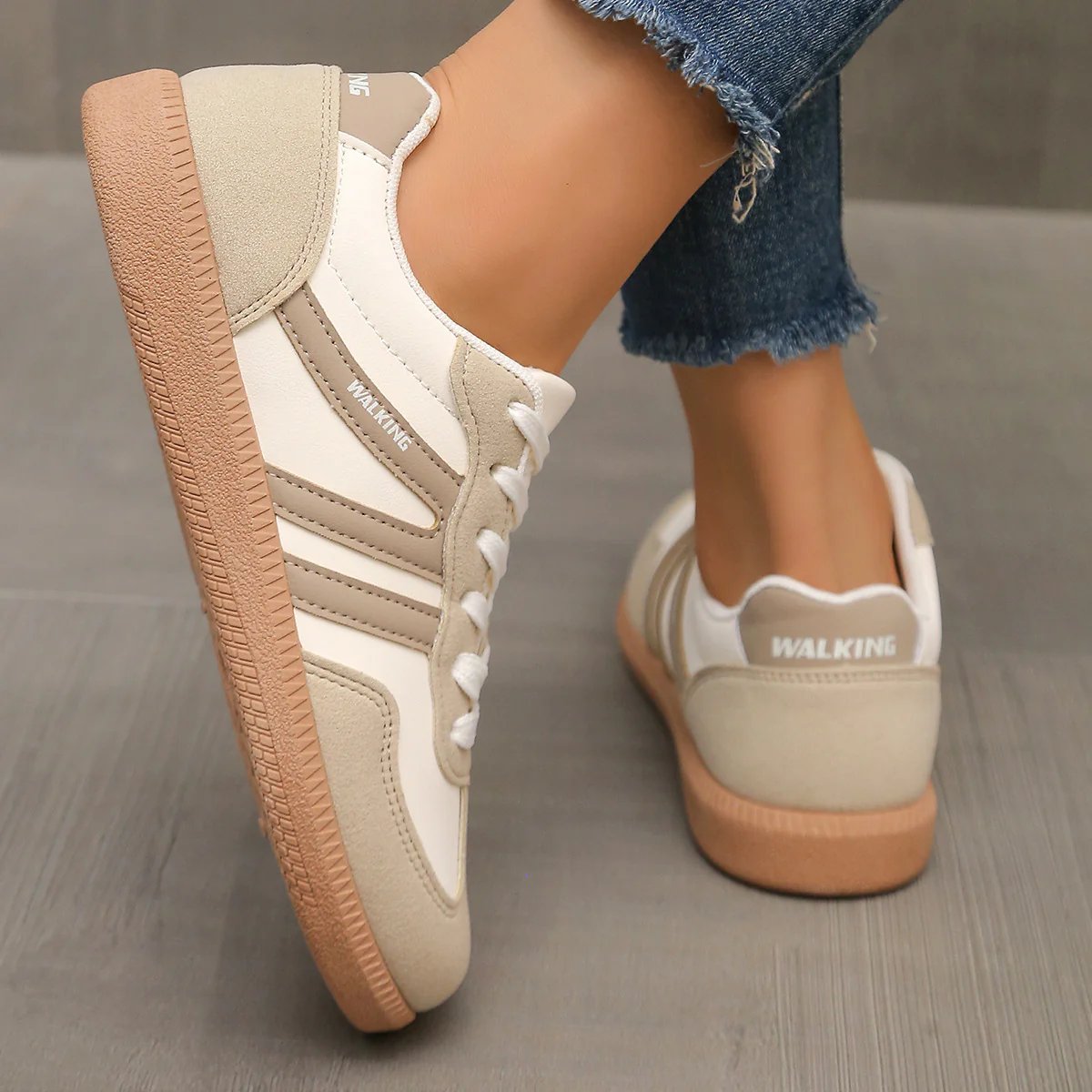 Briony Orthopaedic Cushioned Trainers close-up angled view in white and beige, worn on foot - The Gold Coast Family