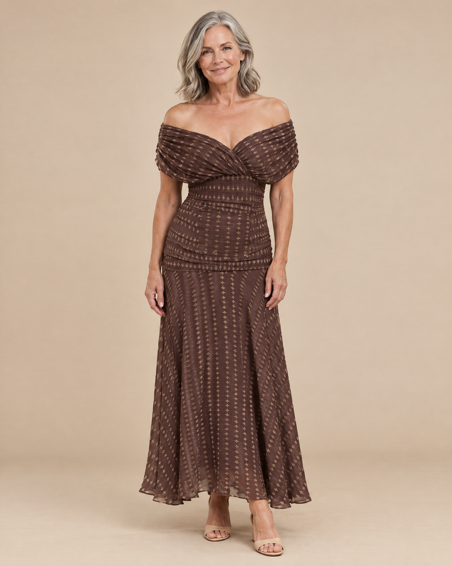 light brown geometric print dress in a light beige studio