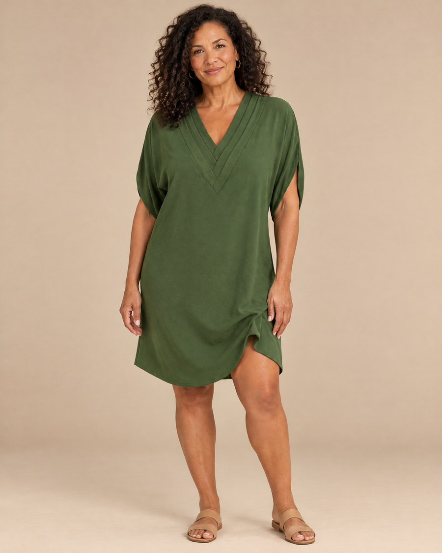 priscilla dress in a light beige studio